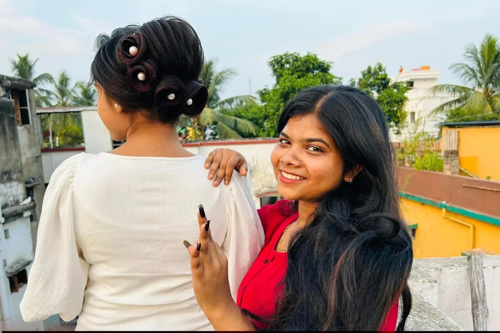 Elegant Pearl Roll Bun Hairstyle by Prerana's Makeover